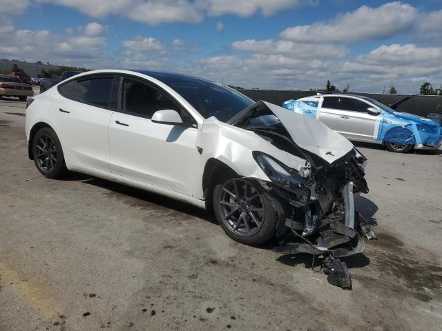 2023 Tesla Model 3 VIN 5YJ3E1EAXPF563560 COPART salvage auction — FRONT END, Fl - Cert Of Title Slvg Rebuildable, sold $4,100 on 2026-07-09 (photo 4)