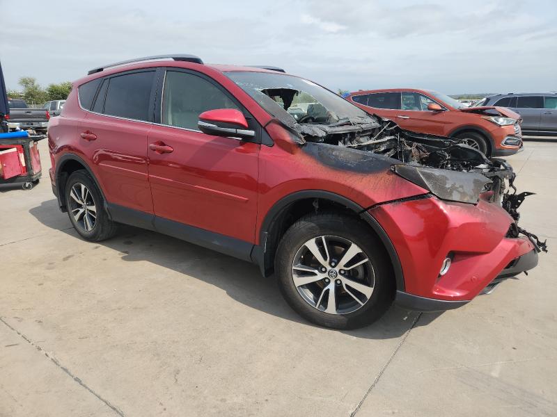 2017 Toyota Rav4 VIN JTMRFREV3HJ112330 COPART salvage auction — ENGINE BURN, TX - NONREPAIRABLE TITLE, sold $2,250 on 2026-07-13 (photo 4)