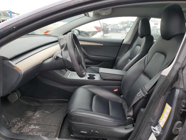 2023 Tesla Model 3 VIN 5YJ3E1EA7PF680965 COPART salvage auction — REAR END, ID - SALVAGE CERTIFICATE OF TITLE, sold $8,200 on 2026-07-02 (photo 7)