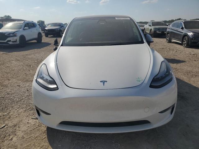 2023 Tesla Model y VIN 7SAYGDEE5PA144262 COPART salvage auction — UNDERCARRIAGE, Mo - Salvage Certificate Of Title, sold $1,300 on 2026-07-28 (photo 5)