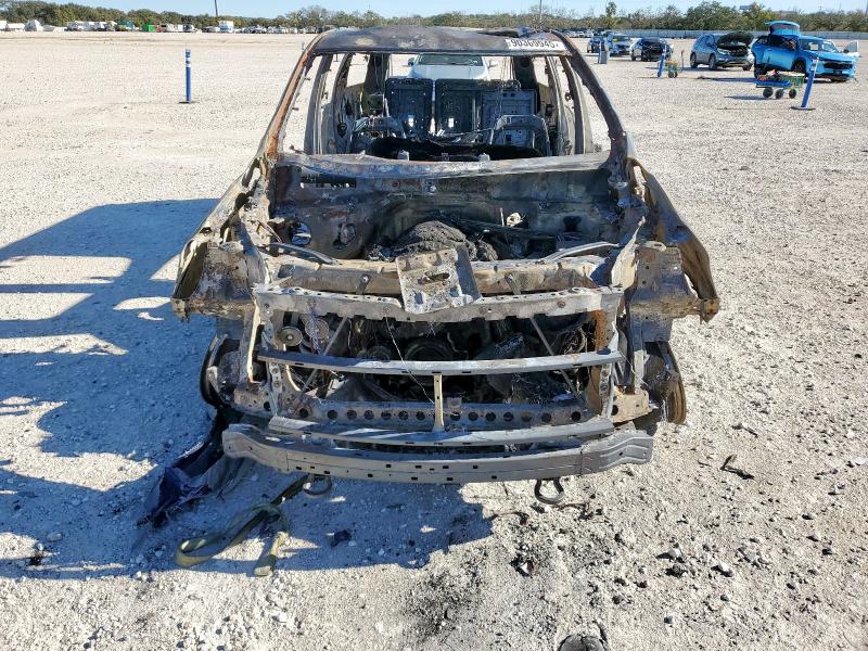 2024 Chevrolet Suburban VIN 1GNSKDKD7RR357038 COPART salvage auction — BURN, Tx - Nonrepairable Title, sold $100 on 2026-07-02 (photo 5)