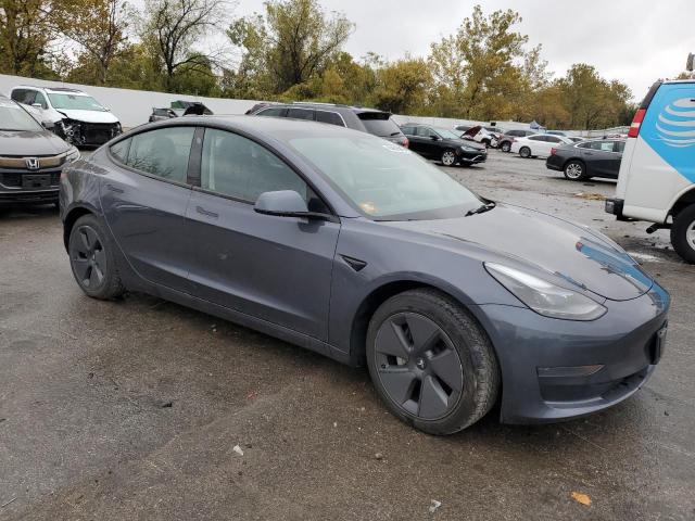 2023 Tesla Model 3 VIN 5YJ3E1EA7PF680965 COPART salvage auction — REAR END, ID - SALVAGE CERTIFICATE OF TITLE, sold $8,200 on 2026-07-02 (photo 4)