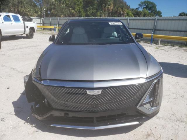 2025 Cadillac Lyriq VIN 1GYKPNRL5SZ310085 COPART salvage auction — SIDE, Fl - Cert Of Title Slvg Rebuildable, sold $3,350 on 2026-07-29 (photo 5)