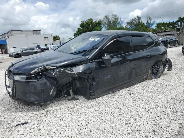 2024 BMW Ix VIN WB523CF04RCN46056 COPART salvage auction — FRONT END, Fl - Certificate Of Destruction, sold $6,100 on 2026-07-28 (photo 1)