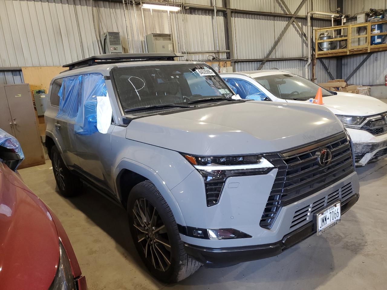 2025 Lexus GX VIN JTJVBCDX1S5040146 COPART salvage auction — Vandalized, Salvage Title, sold $70,000 on 2025-12-22 (photo 4)