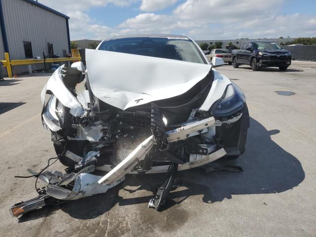 2023 Tesla Model 3 VIN 5YJ3E1EAXPF563560 COPART salvage auction — FRONT END, Fl - Cert Of Title Slvg Rebuildable, sold $4,100 on 2026-07-09 (photo 5)