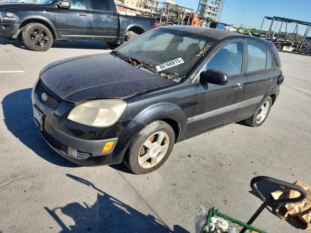 2006 Kia Rio VIN KNADE163366060271 COPART salvage auction — NORMAL WEAR, LA - PERMIT TO SELL-SALVAGE VEHICLE, sold $325 on 2026-07-15 (photo 1)