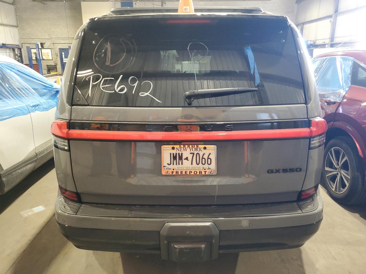 2025 Lexus GX VIN JTJVBCDX1S5040146 COPART salvage auction — Vandalized, Salvage Title, sold $70,000 on 2025-12-22 (photo 6)
