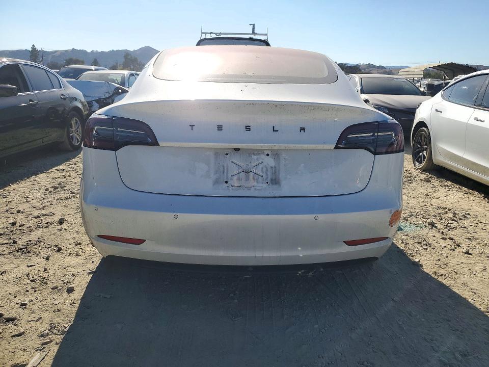2017 Tesla Model 3 VIN 5YJ3E1EA2HF002612 COPART salvage auction — SIDE, CA - DIS/DLR/EXP ONLY CLEAN TITLE, sold $0 on 2026-10-10 (photo 6)