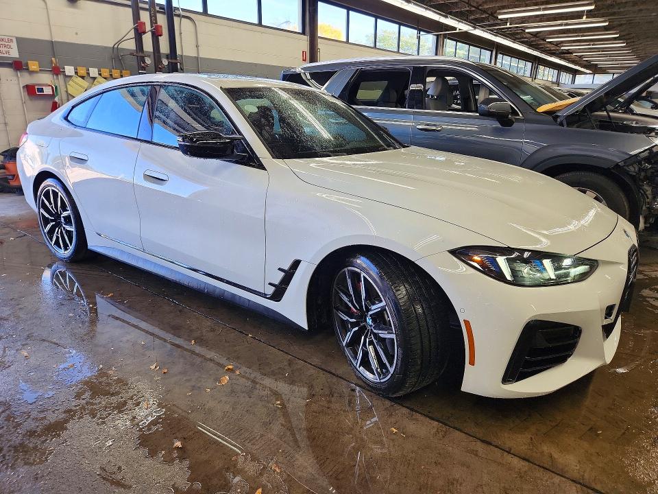 2026 BMW M440i VIN WBA63FB09TFX13950 COPART salvage auction — UNDERCARRIAGE, AZ - CERTIFICATE OF TITLE, sold $37,750 on 2026-10-19 (photo 4)