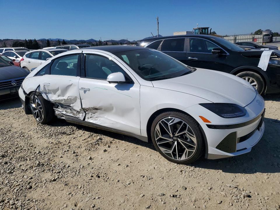 2023 Hyundai Ioniq 6 VIN KMHM54AA2PA035530 COPART salvage auction — SIDE, CA - SALVAGE CERTIFICATE, sold $7,800 on 2026-10-15 (photo 4)