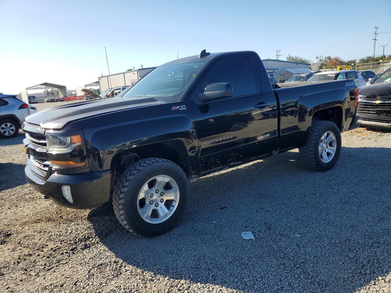 2017 Chevrolet Silverado 1500 VIN 1GCNKREC9HZ141888 — COPART salvage auction photo