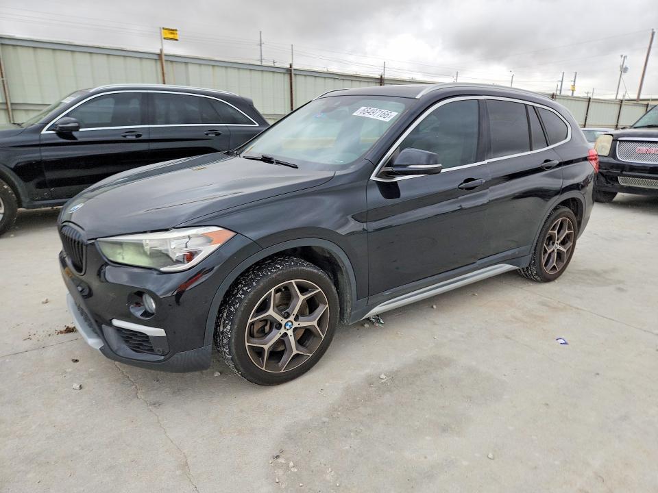 2019 BMW X1 VIN WBXHU7C53K5L10501 — COPART salvage auction photo