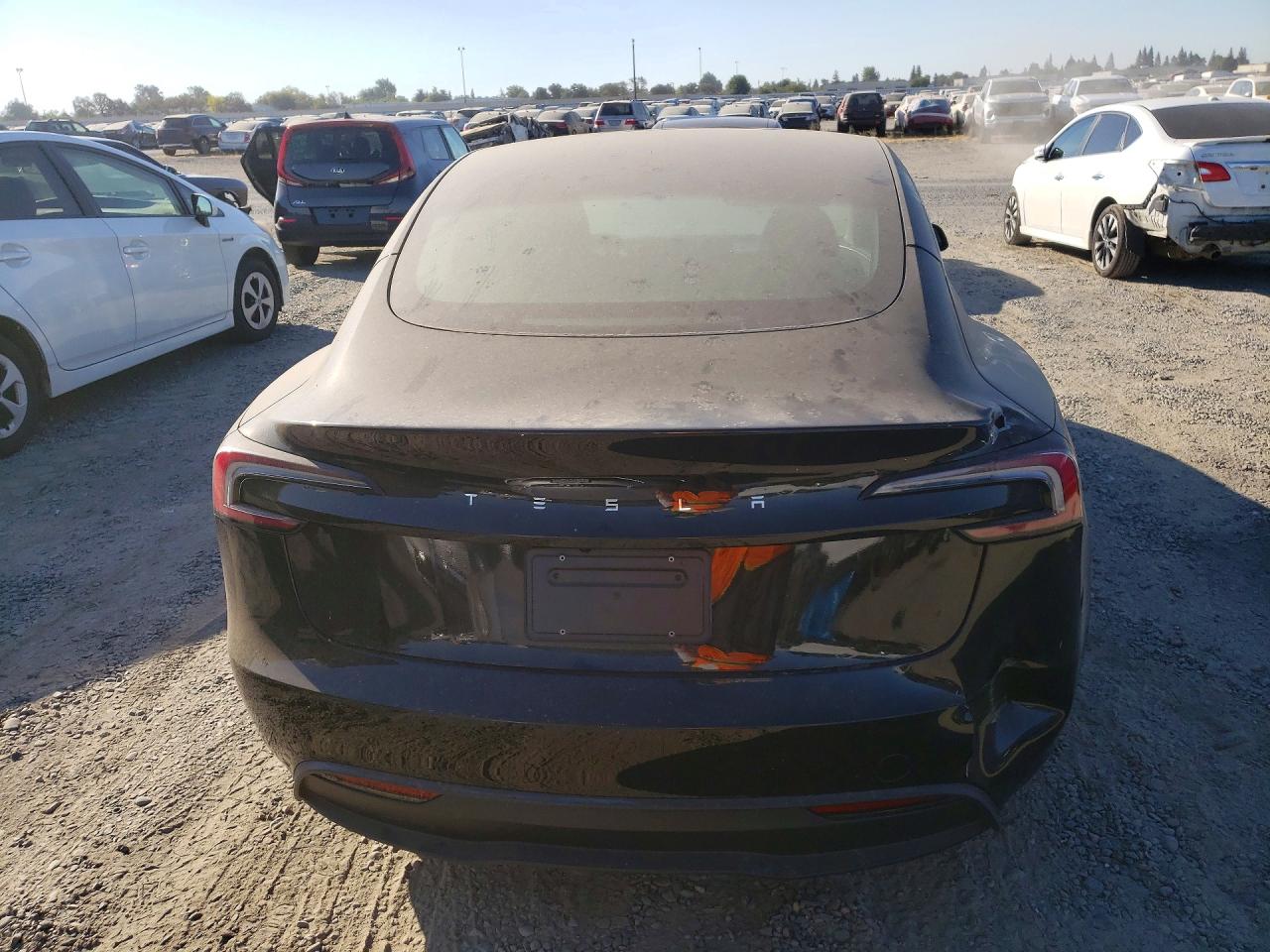 2024 Tesla Model 3 VIN 5YJ3E1EAXRF765902 COPART salvage auction — Rear End, CA - SALVAGE CERTIFICATE, sold $15,000 on 2026-10-10 (photo 6)