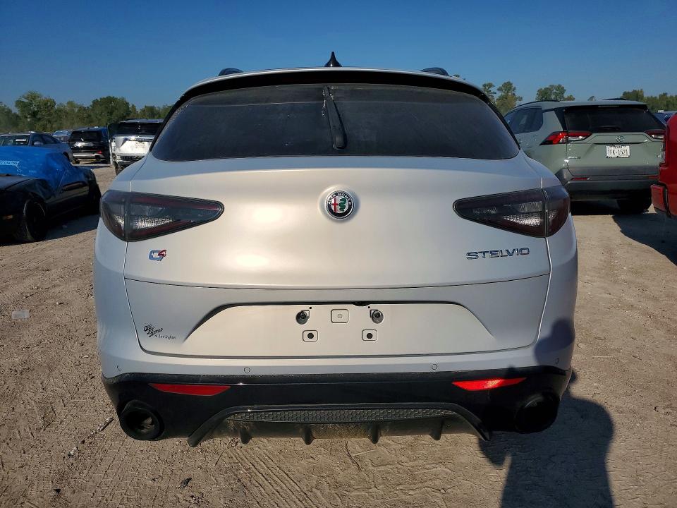 2024 Alfa romeo Stelvio VIN ZASPAKBN8R7D75176 COPART salvage auction — WATER/FLOOD, AL - CERT OF TITLE-FLOOD SALVAGE, sold $6,400 on 2026-10-20 (photo 6)