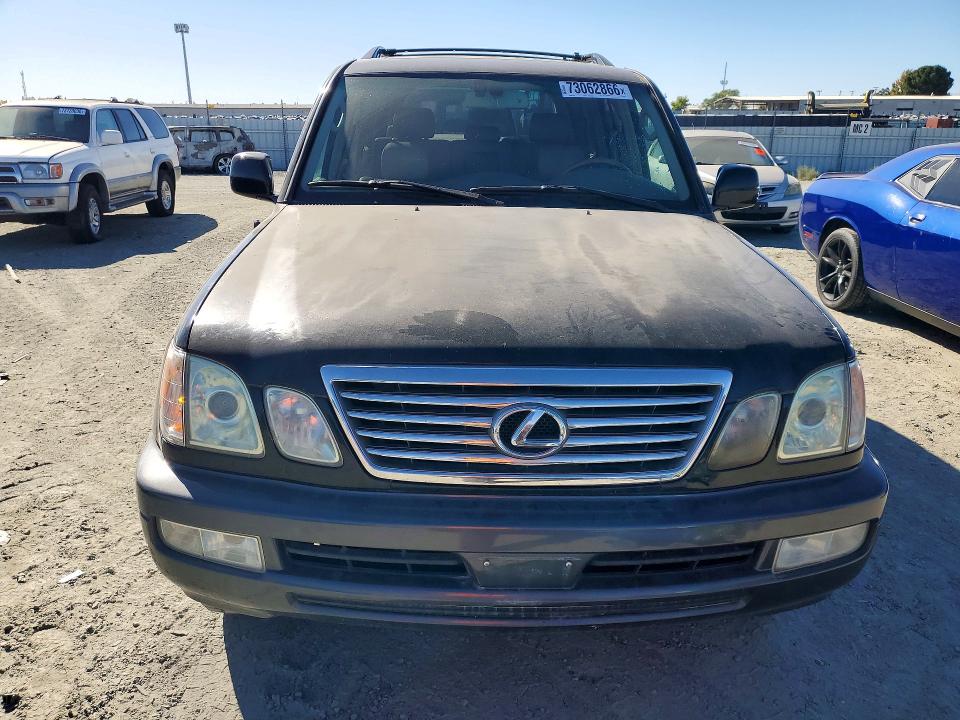 2006 Lexus LX 470 VIN JTJHT00W664004308 COPART salvage auction — MINOR DENT/SCRATCHES, Id - Dis/Dlr/Exp Only Clean Title, sold $4,550 on 2026-10-20 (photo 5)