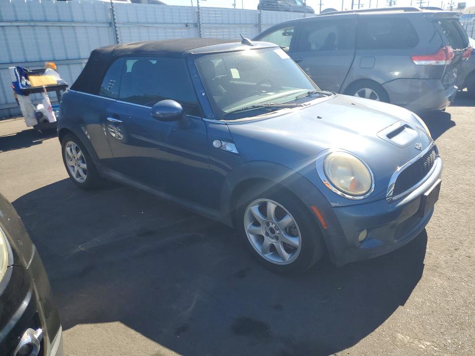 2010 Mini Cooper VIN WMWMS3C5XATY51076 COPART salvage auction — MINOR DENT/SCRATCHES, CA - DIS/DLR/EXP ONLY CLEAN TITLE (P), sold $500 on 2026-10-07 (photo 4)