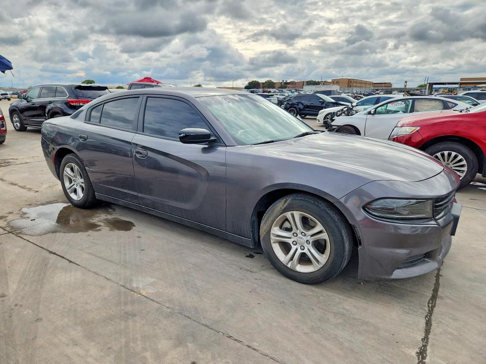 2023 Dodge Charger VIN 2C3CDXBG3PH702859 COPART salvage auction — SIDE, Salvage Title, sold $9,800 on 2026-10-20 (photo 4)
