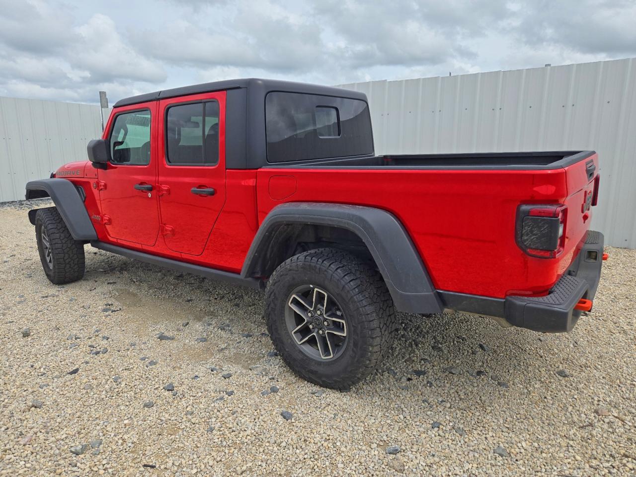 2026 Jeep Gladiator VIN 1C6RJTEG3TL150822 COPART salvage auction — Minor Dent/Scratches, FL - CERT OF TITLE-SLVG REBLD FLOOD, sold $12,200 on 2026-10-14 (photo 2)