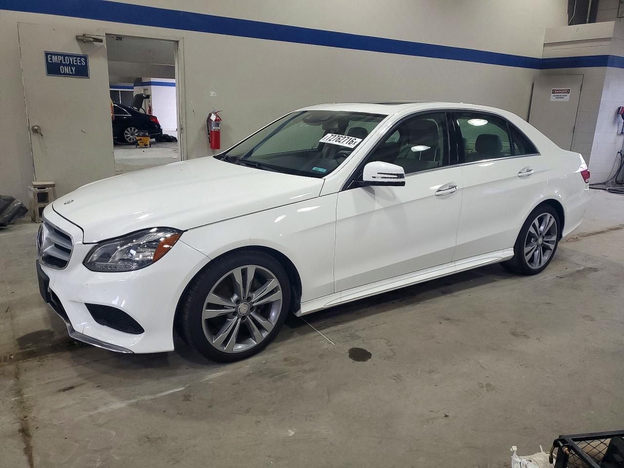 2014 Mercedes-Benz E-Class VIN WDDHF5KB3EA875061 — COPART salvage auction photo