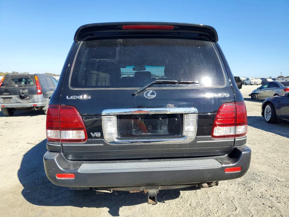 2006 Lexus LX 470 VIN JTJHT00W664004308 COPART salvage auction — MINOR DENT/SCRATCHES, Id - Dis/Dlr/Exp Only Clean Title, sold $4,550 on 2026-10-20 (photo 6)