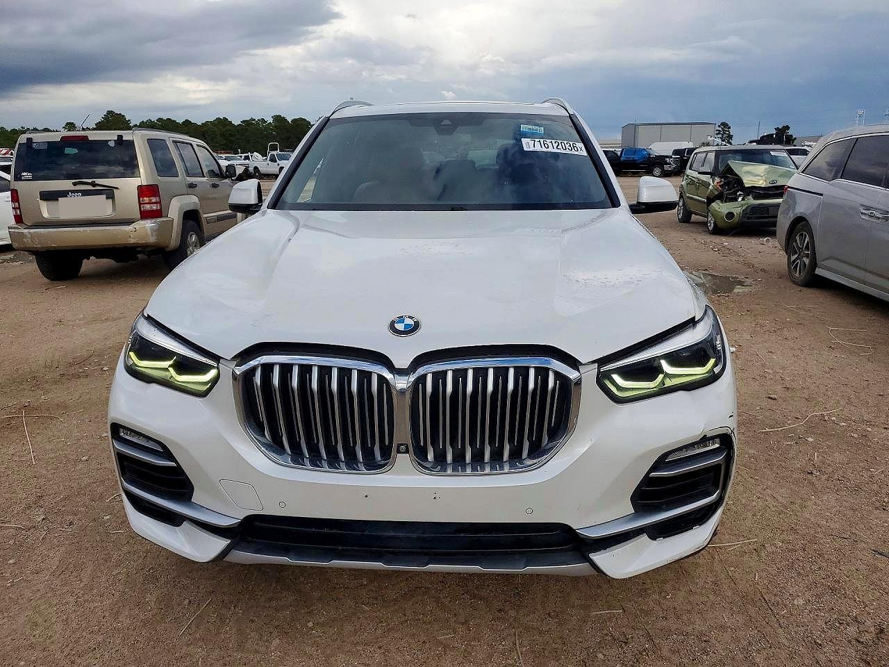 2019 BMW X5 VIN 5UXCR6C5XKLK83794 COPART salvage auction — Minor Dent/Scratches, TX - CERTIFICATE OF TITLE (P), sold $14,100 on 2026-10-14 (photo 5)