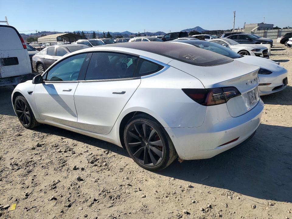2017 Tesla Model 3 VIN 5YJ3E1EA2HF002612 COPART salvage auction — SIDE, CA - DIS/DLR/EXP ONLY CLEAN TITLE, sold $0 on 2026-10-10 (photo 2)