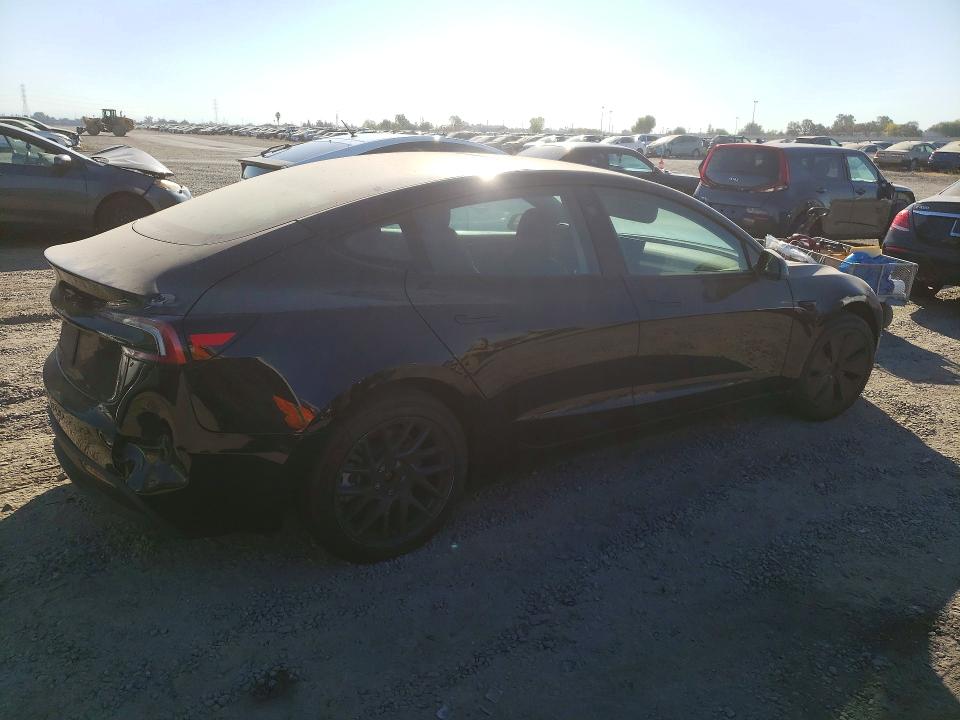2024 Tesla Model 3 VIN 5YJ3E1EAXRF765902 COPART salvage auction — REAR END, Ca - Salvage Certificate, sold $0 on 2026-10-11 (photo 3)