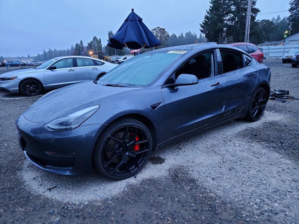 2023 Tesla Model 3 VIN 5YJ3E1EC2PF670491 — COPART salvage auction photo