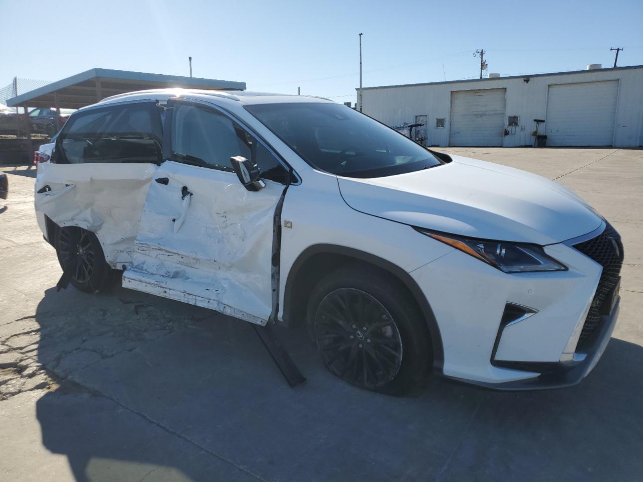2019 LEXUS RX450 VIN 2T2BGMCA4KC036231 COPART salvage auction — SIDE, TX - SALVAGE VEHICLE TITLE, sold $15,300 on 2025-02-17 (photo 4)