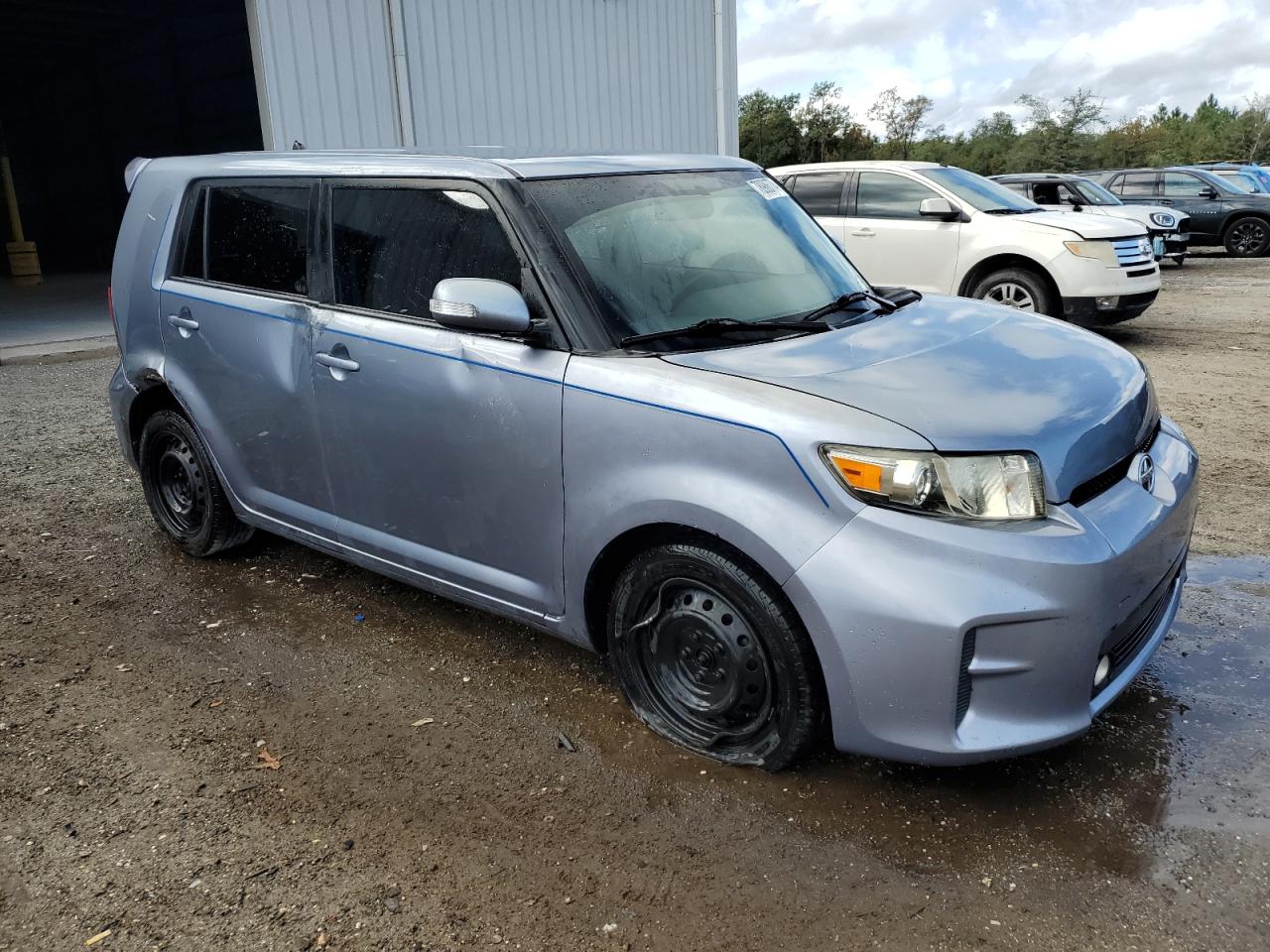 2012 Toyota SCION VIN JTLZE4FE6CJ009498 COPART salvage auction — Side, FL - CERT OF TITLE SLVG REBUILDABLE, sold $1,100 on 2024-12-26 (photo 4)