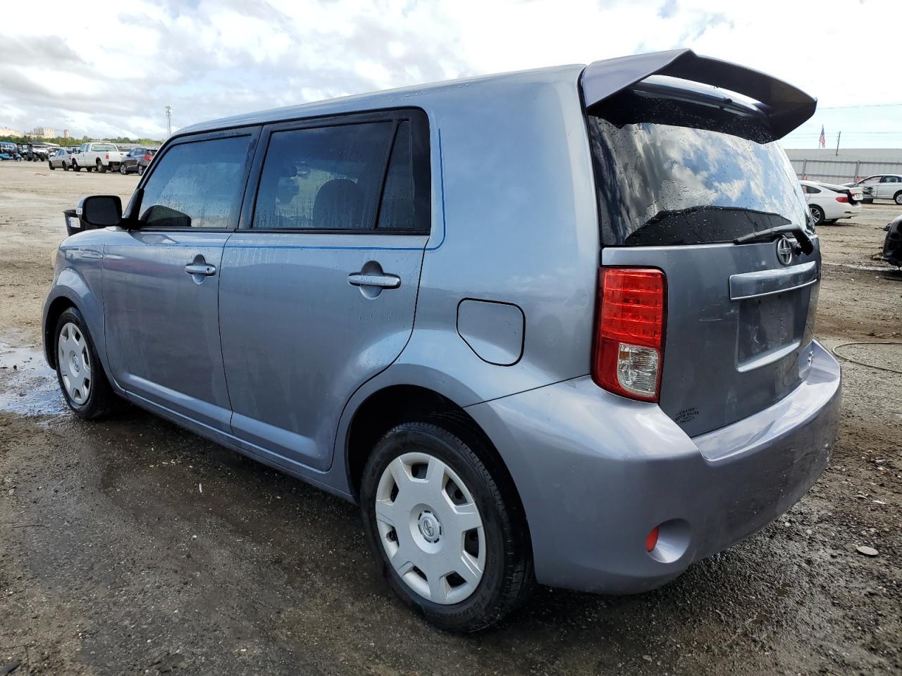 2012 Toyota SCION VIN JTLZE4FE6CJ009498 COPART salvage auction — Side, FL - CERT OF TITLE SLVG REBUILDABLE, sold $1,100 on 2024-12-26 (photo 2)
