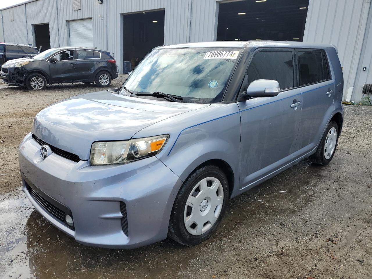 2012 Toyota SCION VIN JTLZE4FE6CJ009498 COPART salvage auction — Side, FL - CERT OF TITLE SLVG REBUILDABLE, sold $1,100 on 2024-12-26 (photo 1)