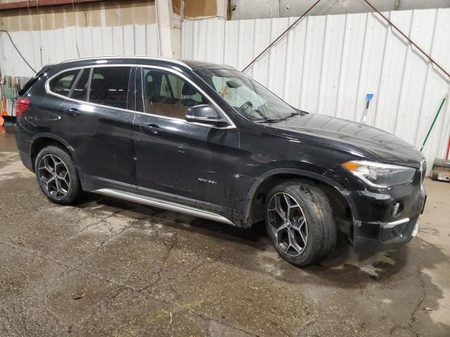 2017 BMW X1 VIN WBXHT3C35H5F87284 COPART salvage auction — REAR END, Ak - Bill Of Sale- Salvage, sold $35 on 2026-07-28 (photo 4)