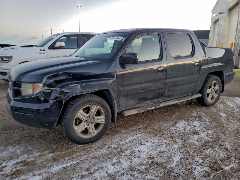 2010 Honda Ridgeline VIN 5FPYK1F59AB504028 — COPART salvage auction photo