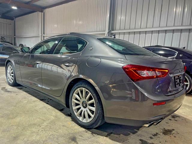 2017 Maserati Ghibli VIN ZAM57XSA9H1206127 COPART salvage auction — Damage History, TX - CERT OF TITLE-REBUILT SALVAGE (P), sold $32,500 on 2025-12-19 (photo 3)