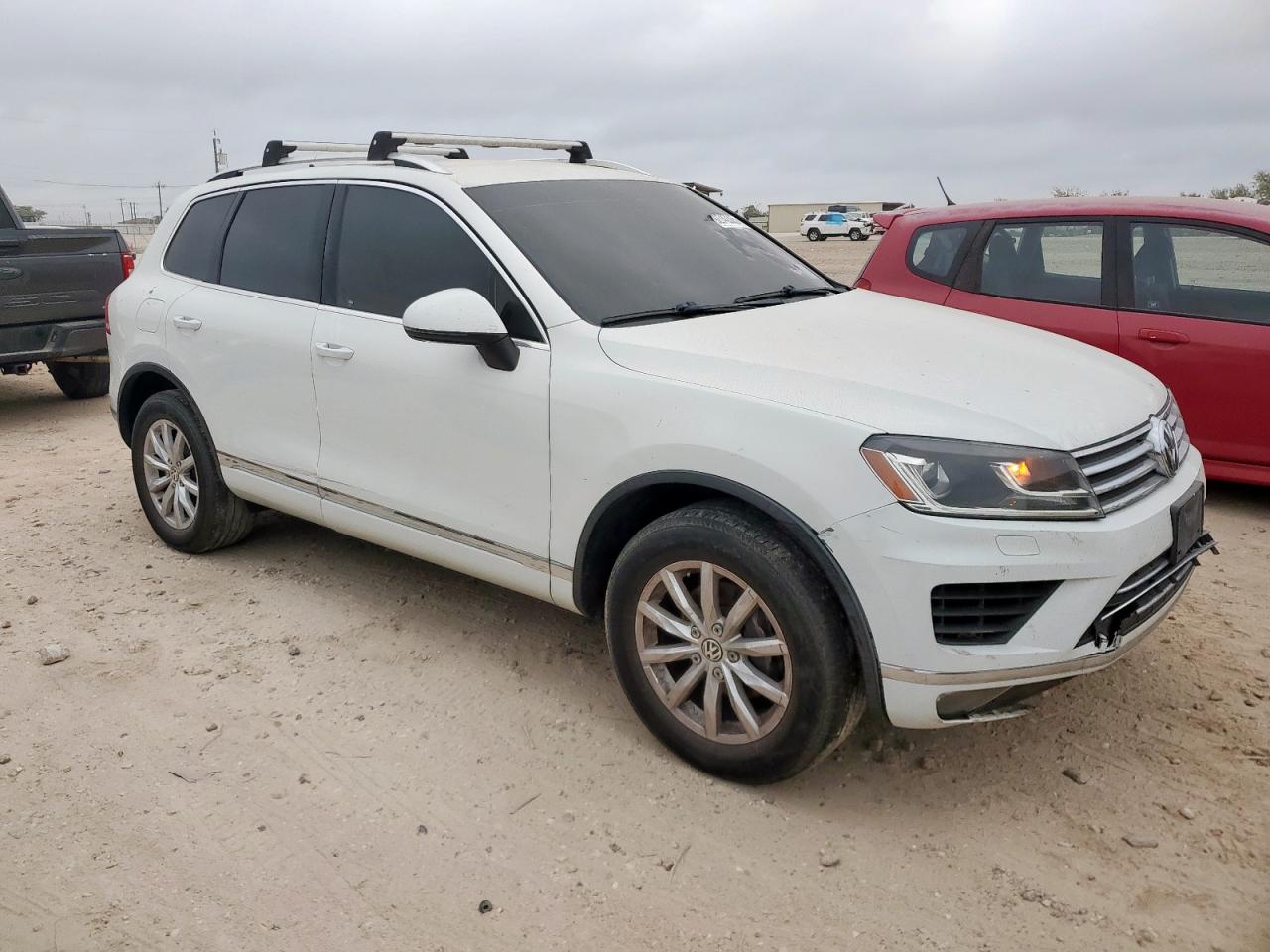 2016 Volkswagen Touareg VIN WVGEF9BP9GD000516 COPART salvage auction — Side, TX - CERTIFICATE OF TITLE, sold $800 on 2026-07-09 (photo 4)
