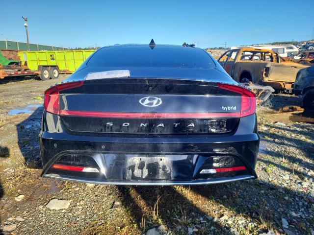 2023 Hyundai Sonata hybrid VIN KMHL34JJ7PA064328 COPART salvage auction — BURN, Ns - Cert Of Reg - Non-Repairable, sold $80 on 2026-07-09 (photo 6)