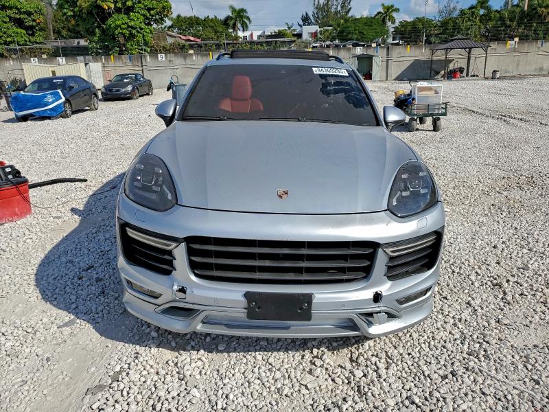 2017 Porsche Cayenne VIN WP1AD2A23HLA82321 COPART salvage auction — SIDE, Salvage Title, sold $25 on 2026-08-07 (photo 5)