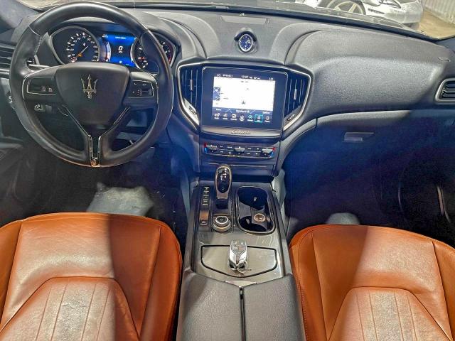 2017 Maserati Ghibli VIN ZAM57XSA9H1206127 COPART salvage auction — Damage History, TX - CERT OF TITLE-REBUILT SALVAGE (P), sold $32,500 on 2025-12-19 (photo 9)