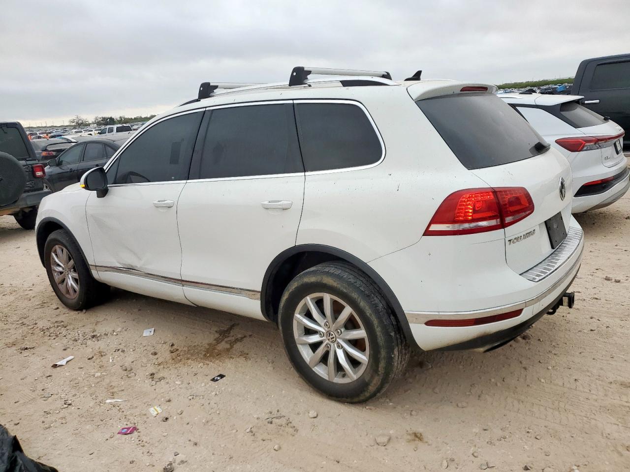 2016 Volkswagen Touareg VIN WVGEF9BP9GD000516 COPART salvage auction — Side, TX - CERTIFICATE OF TITLE, sold $800 on 2026-07-09 (photo 2)
