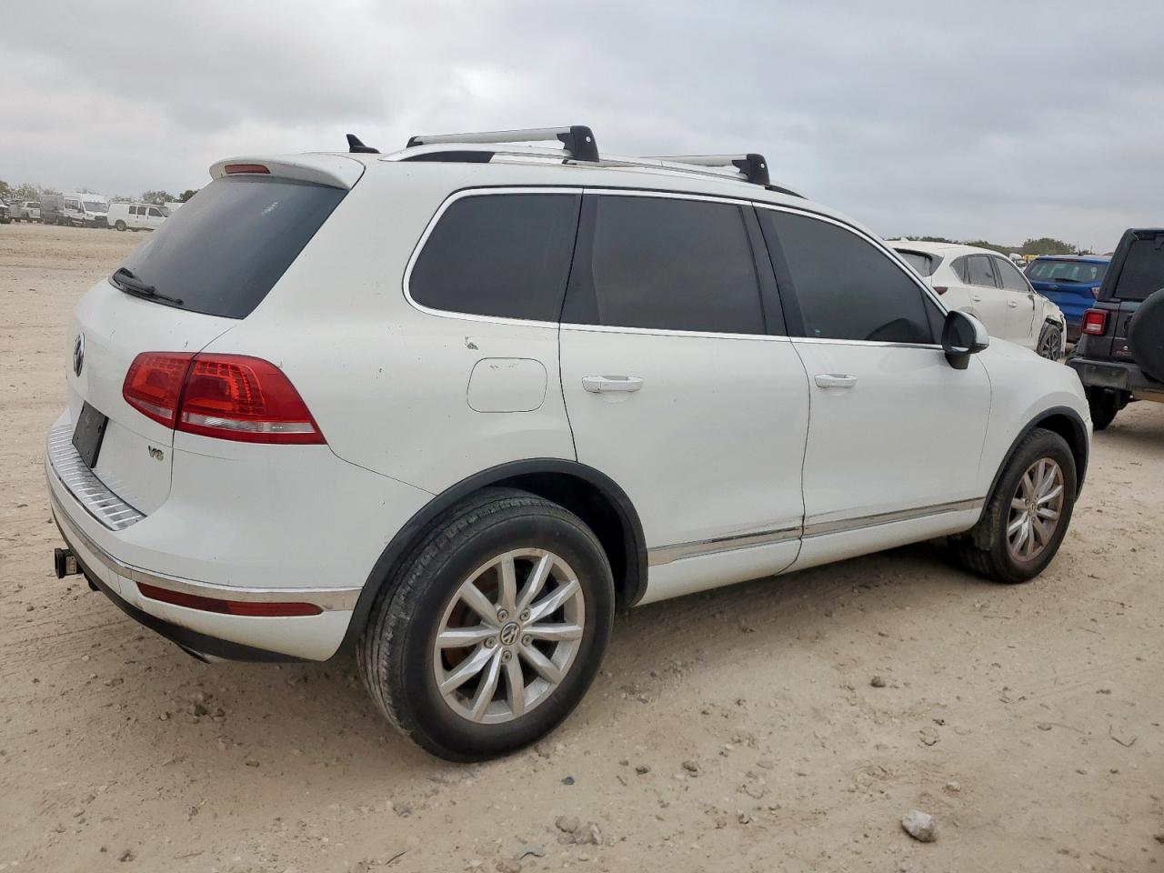 2016 Volkswagen Touareg VIN WVGEF9BP9GD000516 COPART salvage auction — Side, TX - CERTIFICATE OF TITLE, sold $800 on 2026-07-09 (photo 3)