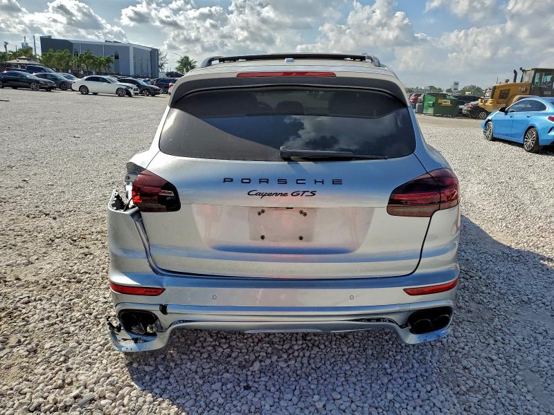 2017 Porsche Cayenne VIN WP1AD2A23HLA82321 COPART salvage auction — SIDE, Salvage Title, sold $25 on 2026-08-07 (photo 6)