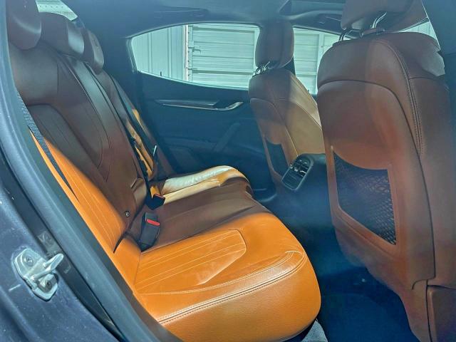 2017 Maserati Ghibli VIN ZAM57XSA9H1206127 COPART salvage auction — Damage History, TX - CERT OF TITLE-REBUILT SALVAGE (P), sold $32,500 on 2025-12-19 (photo 6)