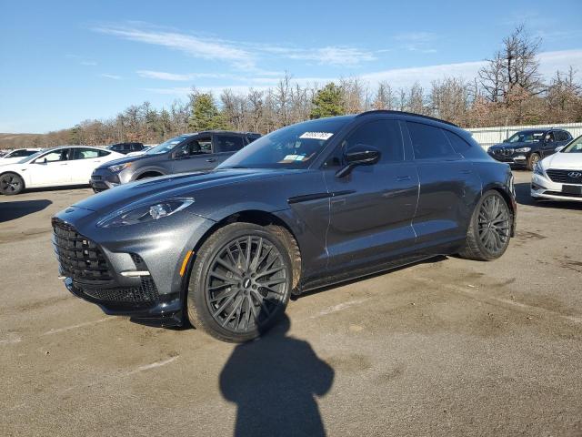 2023 Aston martin Dbx VIN SD7VUJBW9PTV08509 COPART salvage auction — REAR END, Ny - Mv907A-Parts Only, sold $68,000 on 2026-09-21 (photo 1)