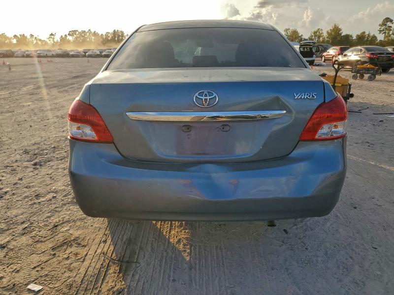2012 Toyota Yaris VIN JTDBT4K33CL018056 COPART salvage auction — REAR END, Other, sold $325 on 2026-07-24 (photo 6)