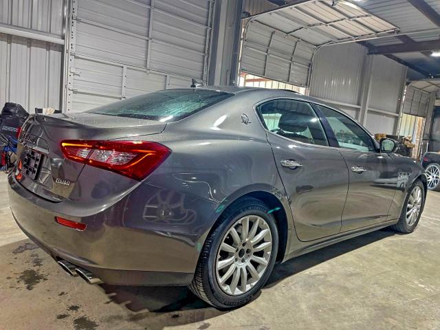 2017 Maserati Ghibli VIN ZAM57XSA9H1206127 COPART salvage auction — Damage History, TX - CERT OF TITLE-REBUILT SALVAGE (P), sold $32,500 on 2025-12-19 (photo 4)