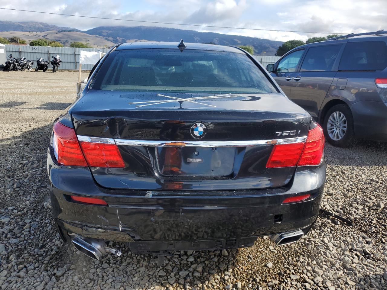 2012 BMW 7 Series VIN WBAKA8C56CDS99676 COPART salvage auction — Side, CA - SALVAGE CERTIFICATE, sold $1,900 on 2026-07-02 (photo 6)
