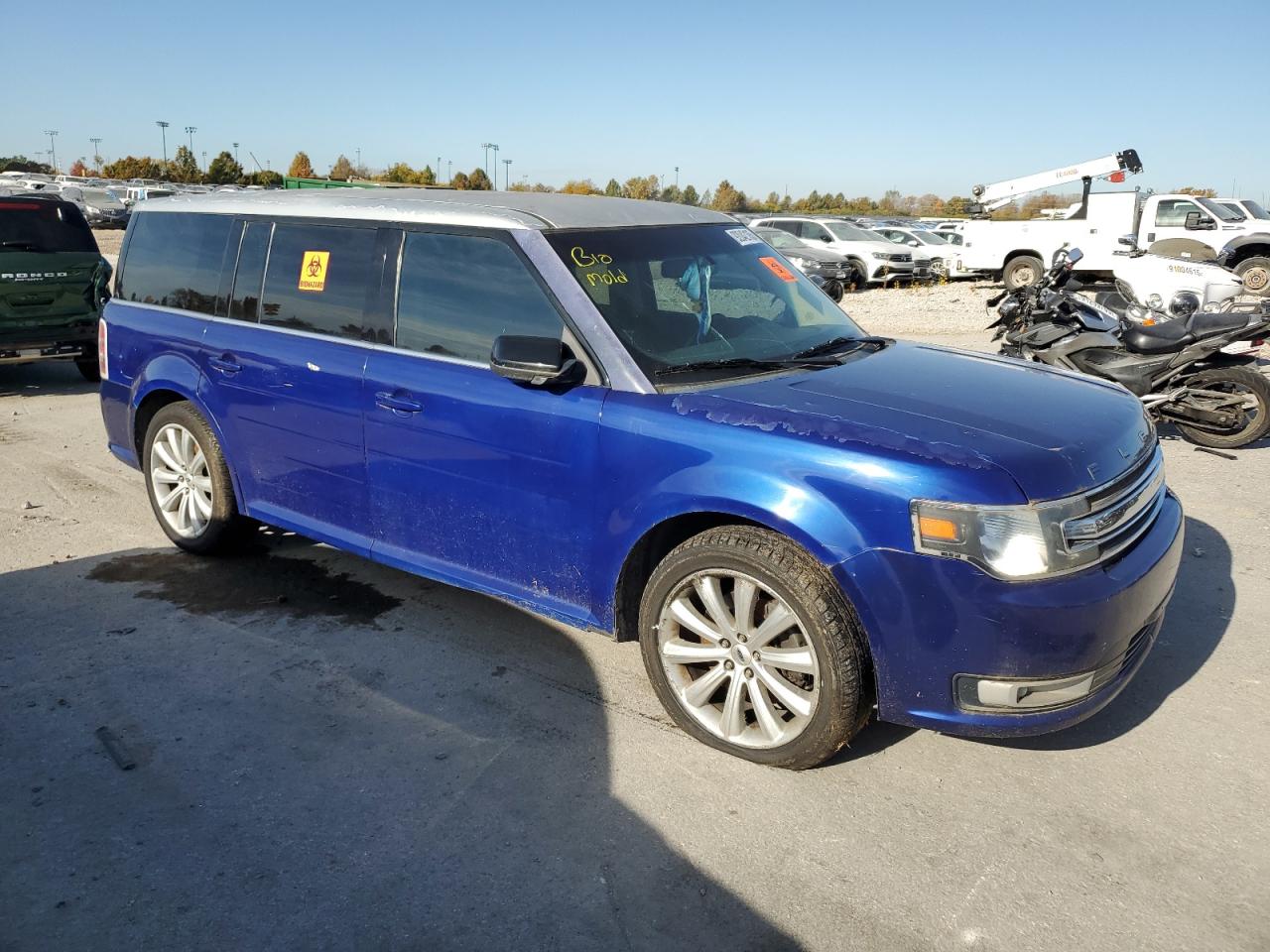 2014 Ford Flex VIN 2FMGK5C86EBD16902 COPART salvage auction — Water/Flood, FL - CERT OF TITLE-SLVG REBLD FLOOD, sold $400 on 2026-07-02 (photo 4)
