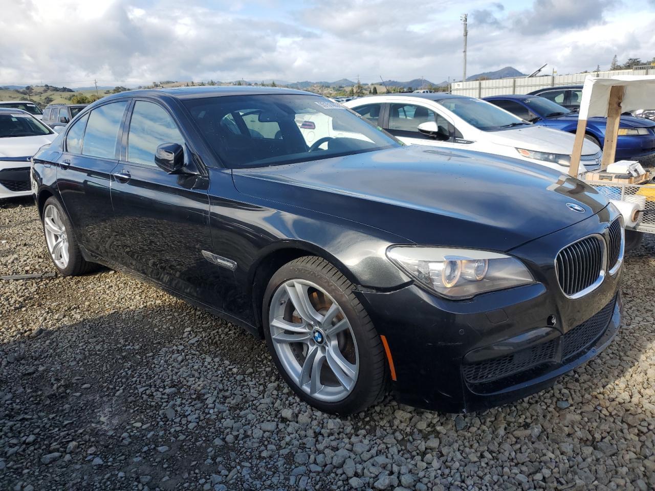 2012 BMW 7 Series VIN WBAKA8C56CDS99676 COPART salvage auction — Side, CA - SALVAGE CERTIFICATE, sold $1,900 on 2026-07-02 (photo 4)